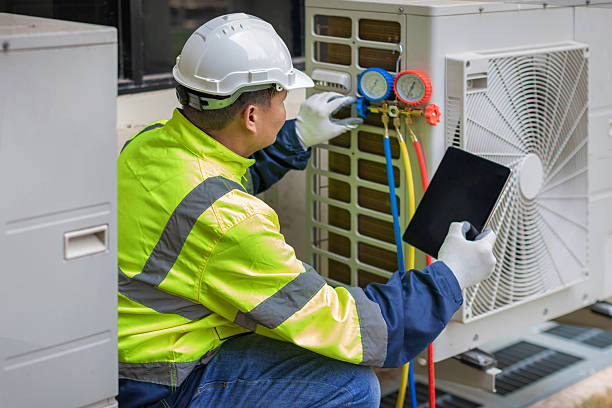 Professional Air Conditioning Repair technician working in Beverly, MA